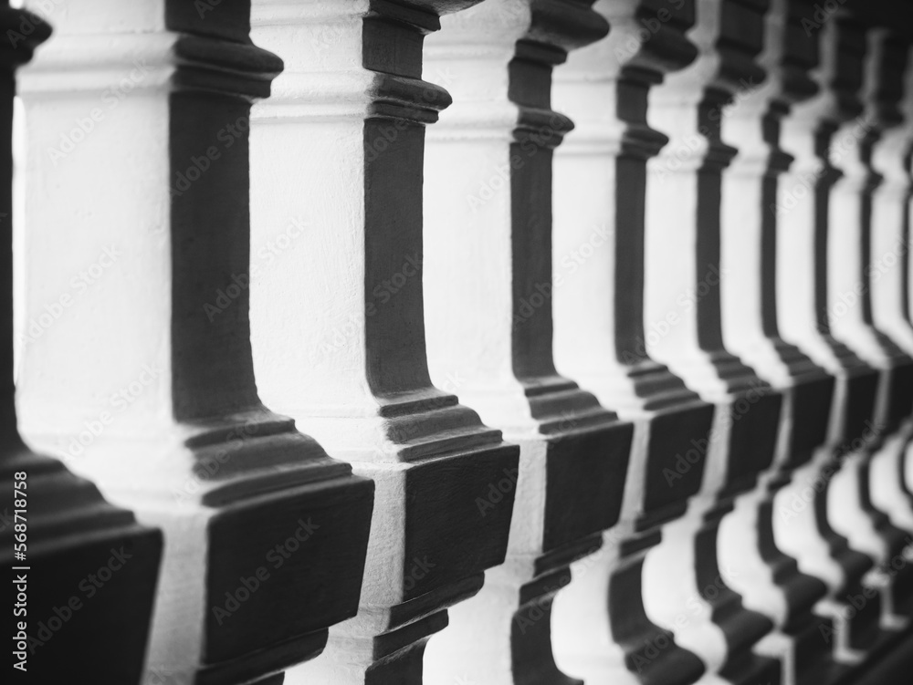 Fototapeta premium White columns in rows shade shadow Architecture details