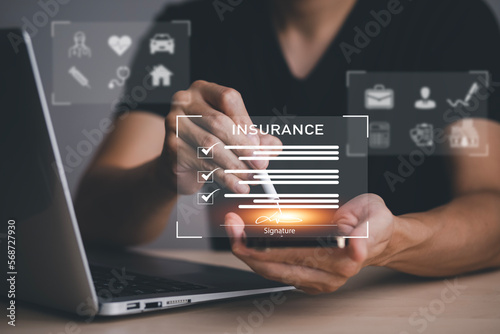 Sign insurance form agreements concept, Businessman signs insurance contracts e-signing digital online, document management, concerning mortgage loan offer for and house insurance