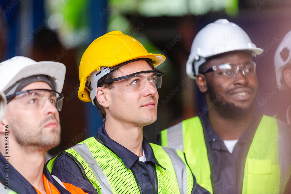 Close up man engineer, Team engineering worker technician, workshop manufacturing, Teamwork in industry factory. group professional technician industrial. Close up man engineer, Team engineering worker technician, workshop manufacturing, Teamwork in industry factory. group professional technician industrial.