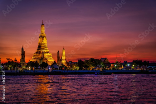 The Buddhist Temple Wat Arun during dusk, one of the most popular and beautiful tourist attractions of Bangkok, Thailand © moofushi