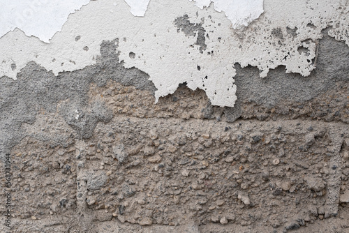 Decaying concrete wall grunge background texture