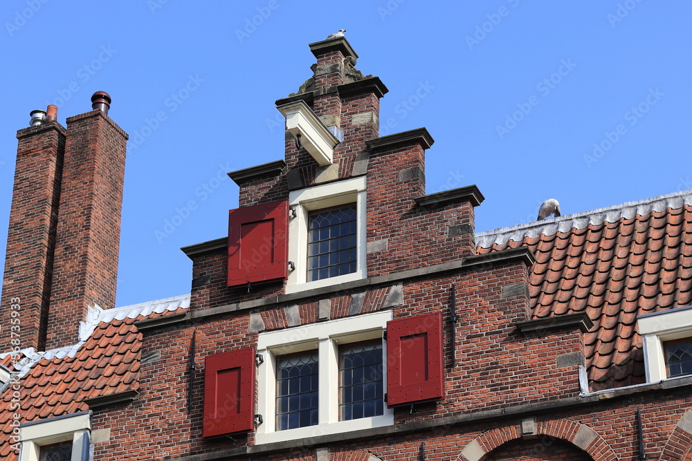Historic Stepped Gable Close Up with Blue Sky in Amsterdam, Netherlands