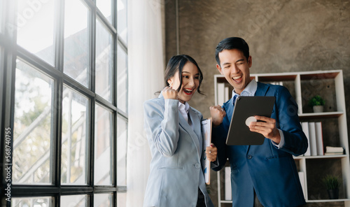 Asian business team creative businesspeople coworker, teamwork celebrating achievement and in planning design in creative in office. Free Download Asian business team creative businesspeople coworker, teamwork celebrating achievement and in planning design in creative in office. - GFXLoad