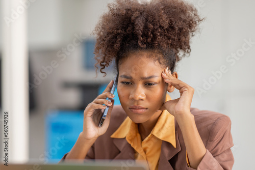Cheerful business african american woman freelancer making telephone call share good news about project working in office workplace, business finance concept.