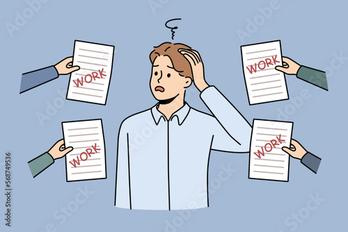 Frustrated male employee overwhelmed with numerous work letters or notifications. Unhappy man worker confused with workload. Vector illustration. 