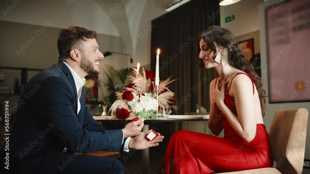 Boy Making Wedding Proposal at the table of a luxury Restaurant Boy Making Wedding Proposal at the table of a luxury Restaurant