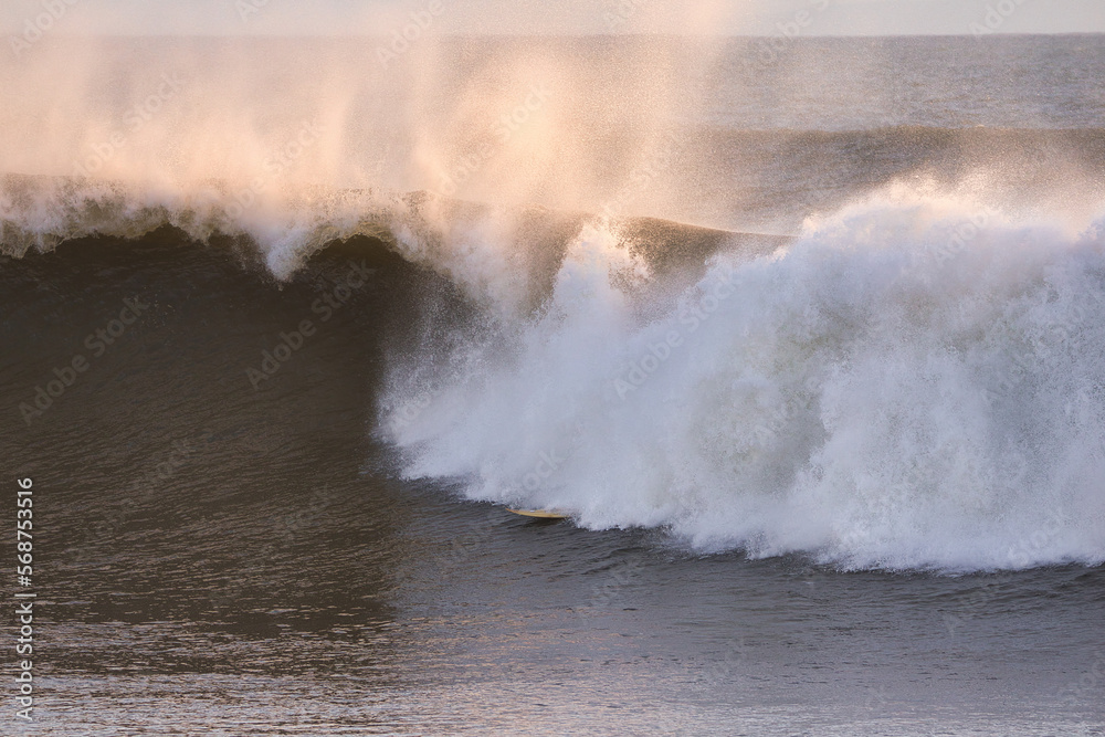 Surfing giant winter waves in Santa Barbara California