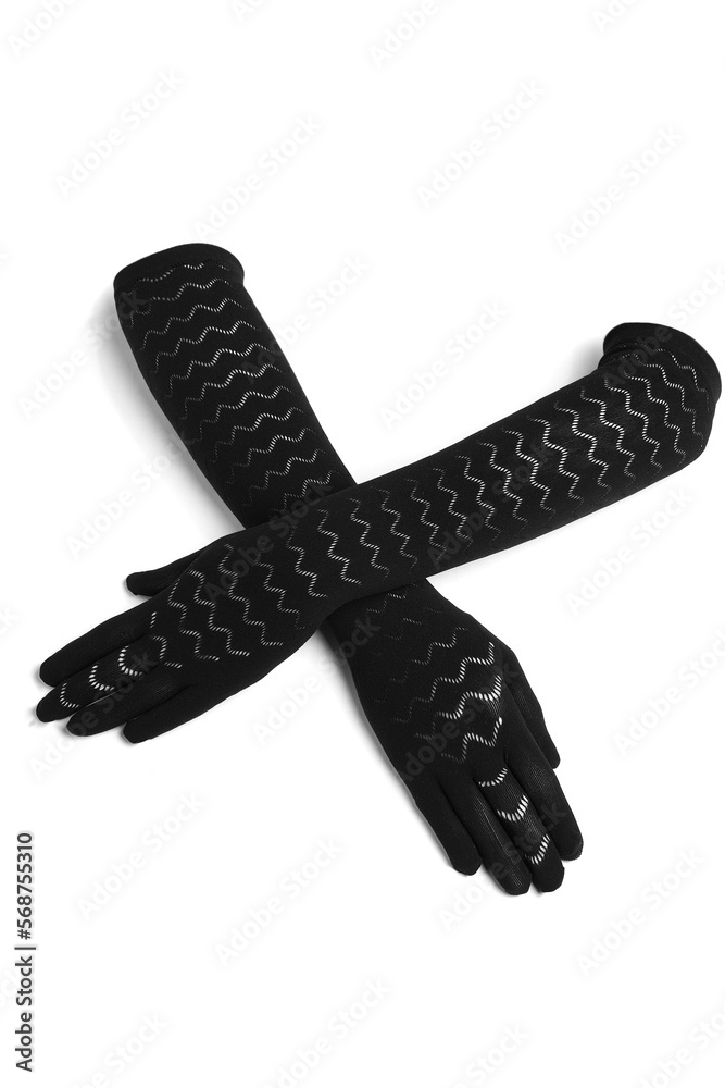 Close-up shot of long black evening gloves. Elegant gloves are made of elastic openwork fine knit fabric. Long gloves are isolated on white background. Front view. Close-up shot of long black evening gloves. Elegant gloves are made of elastic openwork fine knit fabric. Long gloves are isolated on white background. Front view.