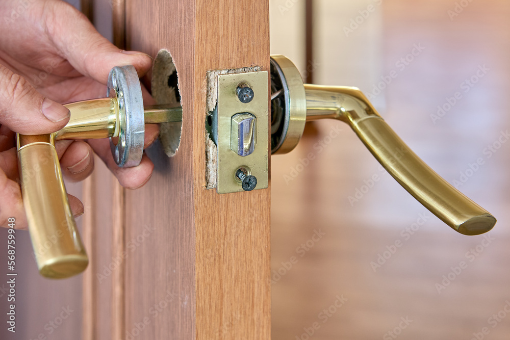 Repair of lever door handle with latch, dismantling of mechanism to