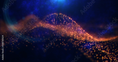 Abstract yellow waves from particles and energy magical dots with glow and blur effect, abstract background