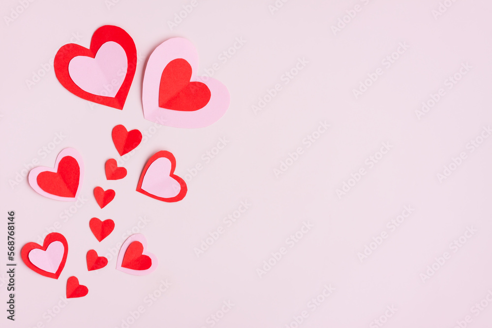 Red and Pink Paper Hearts on pink background, Heart shape papercut, Flower shaped, Happy Valentine's day