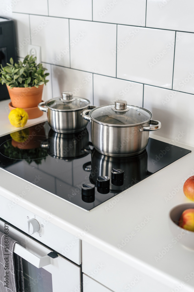 cooking pots on induction stove at cozy kitchen cooking pots on induction stove at cozy kitchen