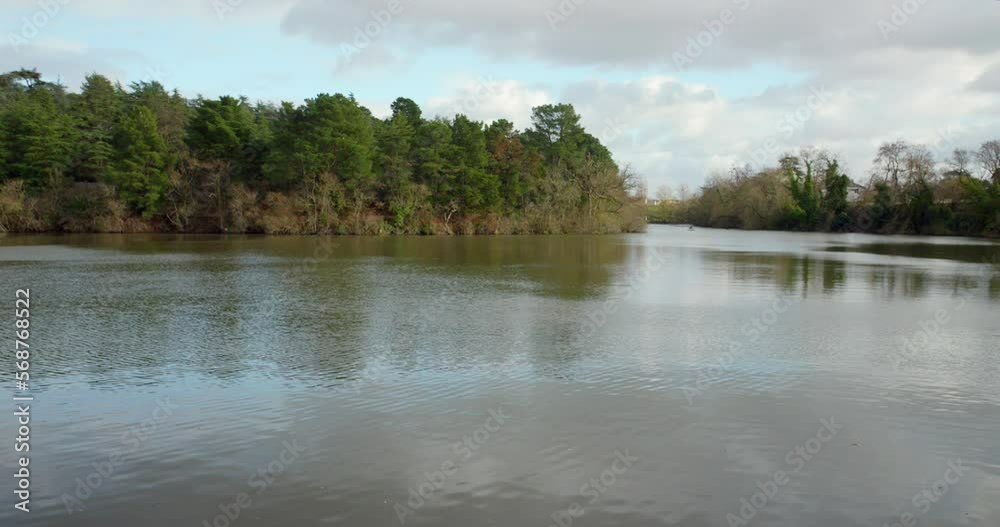 Panoramic View Of The Artificial Lake Of Étang Saint-Nicolas In Angers, Maine-et-Loire, France. Wide Shot Panoramic View Of The Artificial Lake Of Étang Saint-Nicolas In Angers, Maine-et-Loire, France. Wide Shot