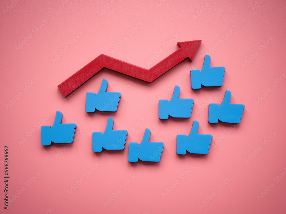 Like symbols and rising arrow as concept of popularity in social media. Like symbols and rising arrow as concept of popularity in social media.