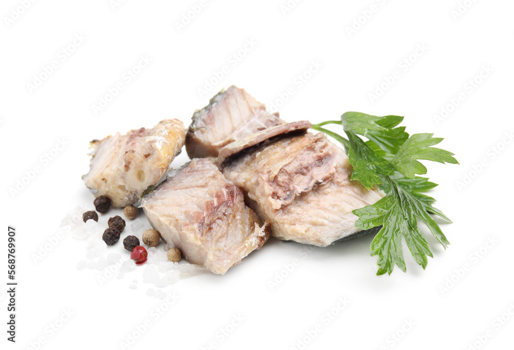Delicious canned mackerel chunks with parsley and spices on white background Delicious canned mackerel chunks with parsley and spices on white background