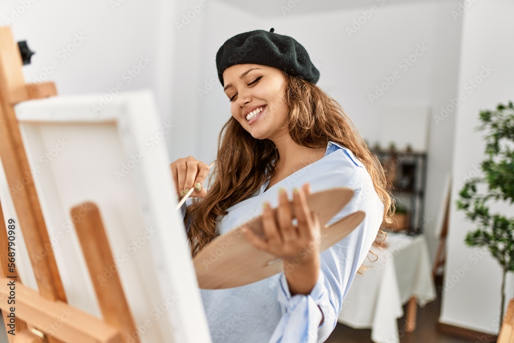 Young beautiful hispanic woman artist smiling confident drawing at art studio Young beautiful hispanic woman artist smiling confident drawing at art studio