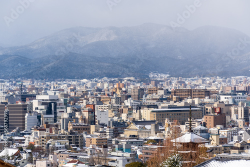Kyoto City skyline panoramic view with snow in winter. © Shawn.ccf