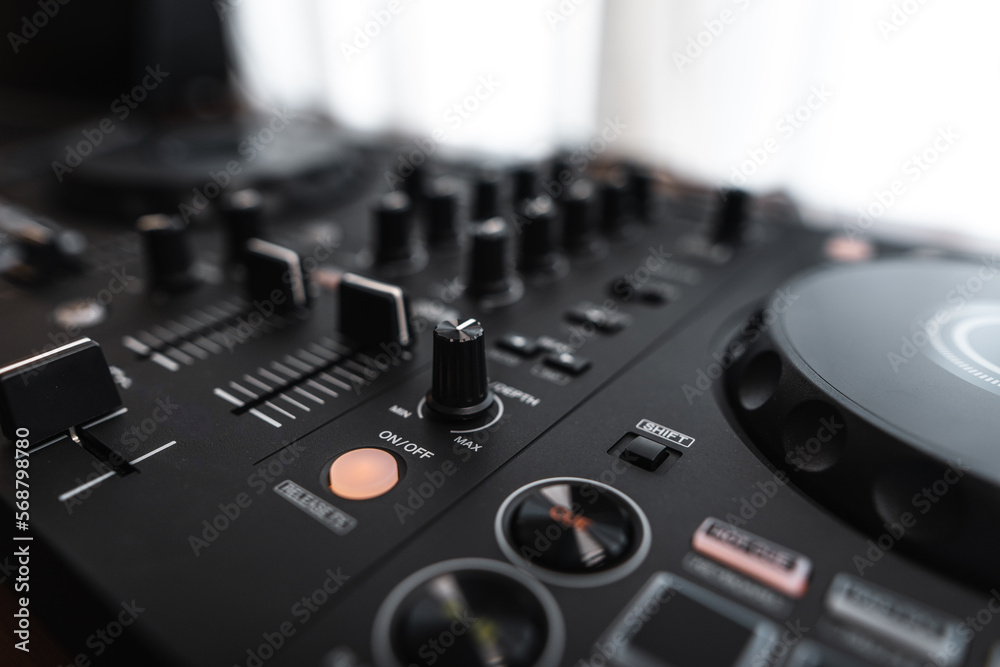 Fototapeta premium Close-up dj controller and Sound mixing desk at home