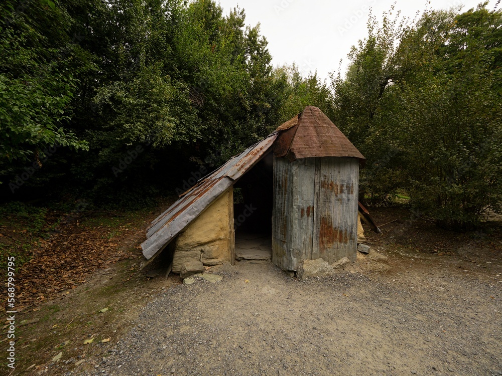 Old historical remains of Chinese settlement traditional simple clay huts in Arrowtown near Queenstown Otago New Zealand Old historical remains of Chinese settlement traditional simple clay huts in Arrowtown near Queenstown Otago New Zealand