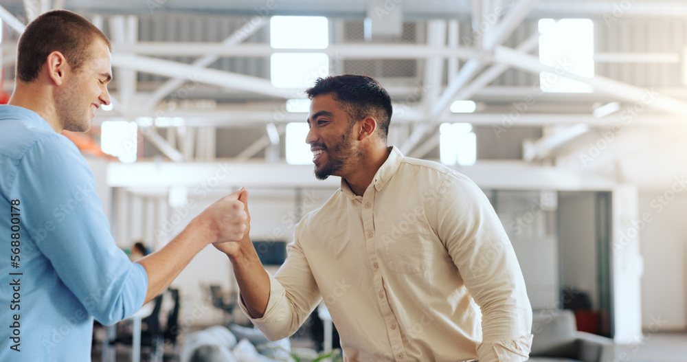 Obraz premium Handshake, greeting and business men at work with a welcome, thank you or communication. Happy, casual and corporate employees with hand gesture for a hello, agreement and coworking in an office