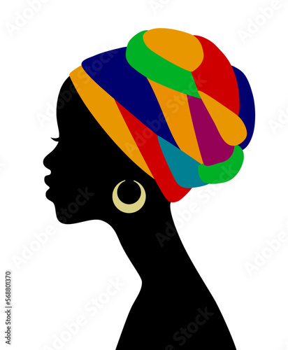 Black silhouette of the head of a young black woman in profile with a colorful headdress isolated on white. Vector illustration