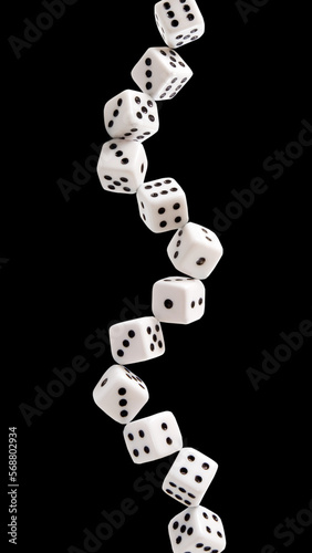 playing dice arranged in a row on a black background