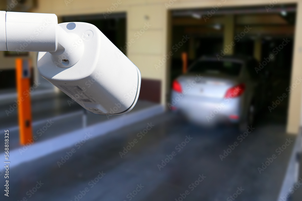 cctv camera installed on the parking lot to protection security. Copy space. cctv camera installed on the parking lot to protection security. Copy space.