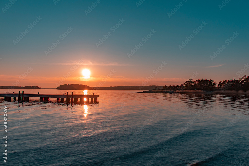 Sunset on the sea, small pier