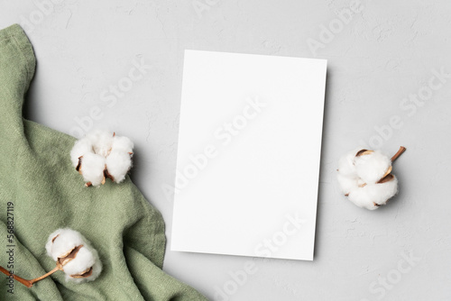 Invitation or greeting card mockup with cotton flowers