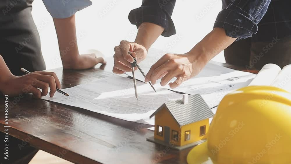 Two business man construction site engineer. Engineering objects on workplace with partners interacting on background