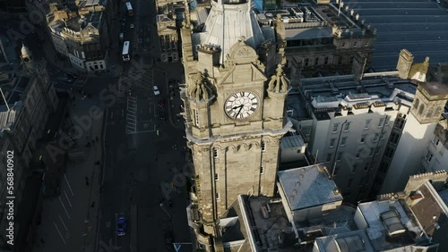 Rising aerial view of The Balmoral hotel near the Waverley Train Station is Edinburgh, Scotland. photo