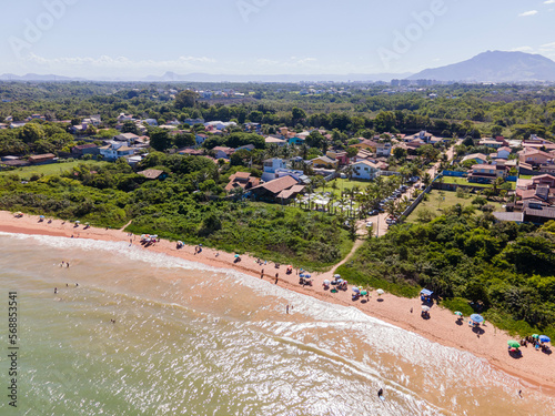 Imagem aérea da Praia dos Fachos na cidade da Serra no litoral do estado do Espírito Santo. Costa tropical com mata atlântica do Brasil. photo