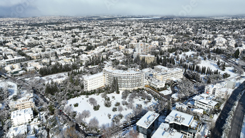Aerial drone photo of famous injury public hospital of Athens known as KAT in Marousi covered up in snow, Attica, Greece photo
