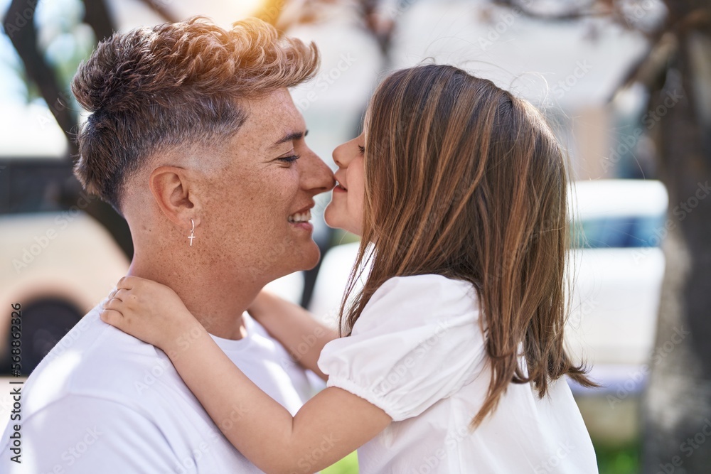 Father and daughter smiling confident standing together kissing at park Father and daughter smiling confident standing together kissing at park
