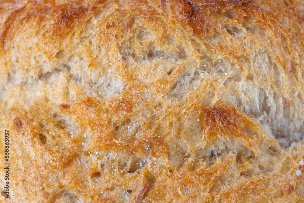 Abstract close-up of white bread background texture.Homemade bread surface. Beautiful crust of bread close-up. Abstract close-up of white bread background texture.Homemade bread surface. Beautiful crust of bread close-up.