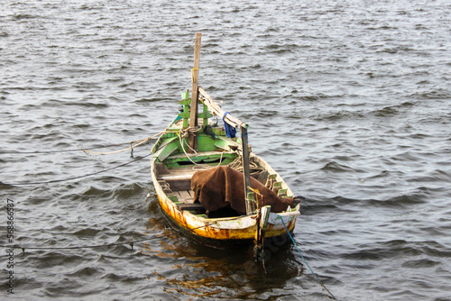 old tradional boat on the ocean photo