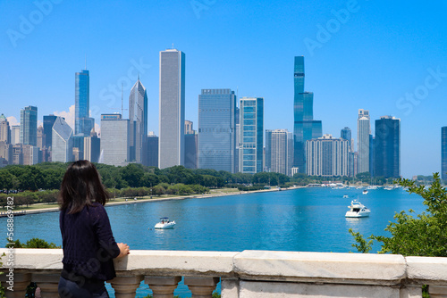 Woman (self) standing on a bridge in Chicago