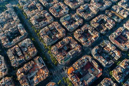 Aerial view of typical buildings of Barcelona cityscape from helicopter. top view, Eixample residencial famous urban grid photo