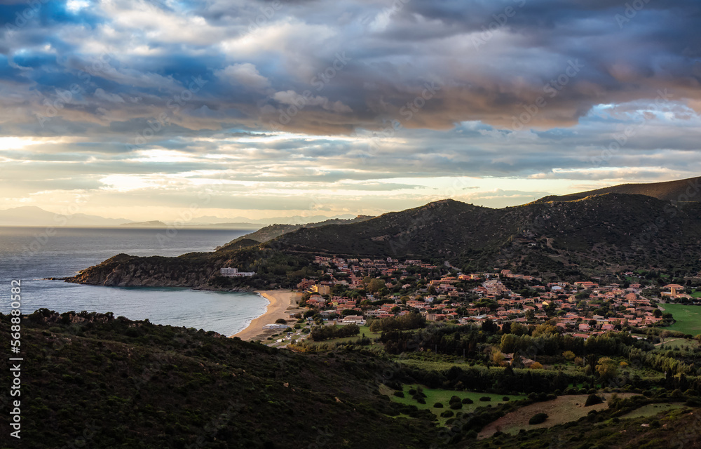 Touristic Town on the Sea Coast. Solanas, Sardinia, Italy. Colorful Sunset Sky.