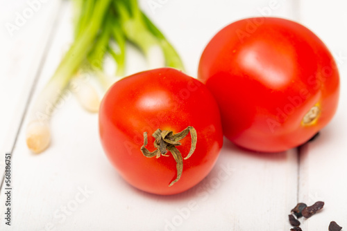 tomatoes on a wooden board