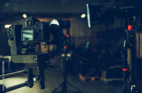 Vászonkép Digital Video Camera Attached to Automatic Jib Arm Inside a Studio
