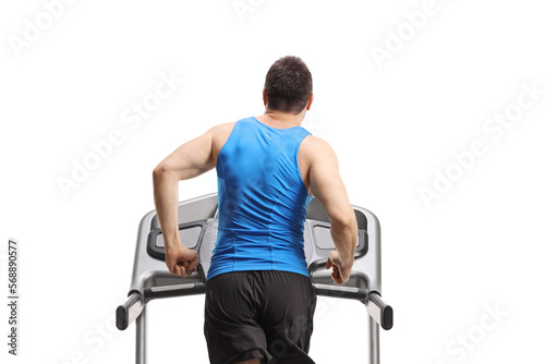 Back view of a man running on a treadmill