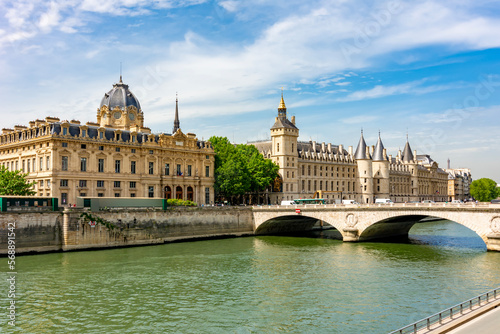 Photography Paris commercial courthouse and Conciergerie palace along Seine river, Paris, Fr