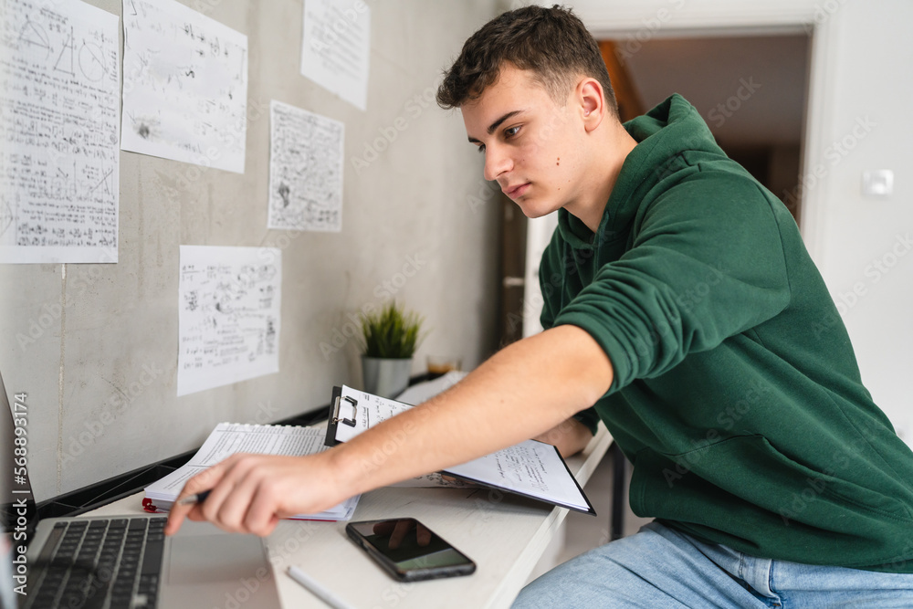 Young man caucasian teenager learning study at home education concept Young man caucasian teenager learning study at home education concept