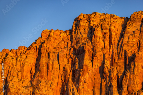USA, Utah, Springdale, Red cliffs at sunset in Zion National Park photo