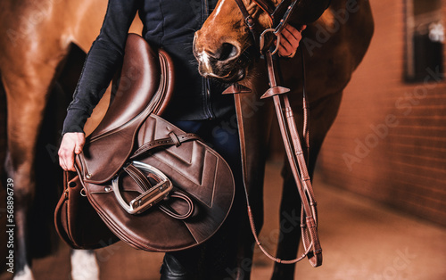 Fotografia Horse Rider with Brown Leather Saddle