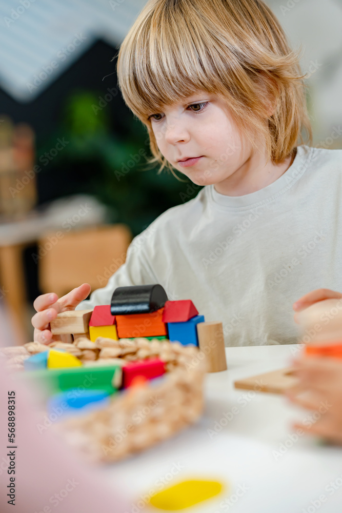 Portrait of a preschool child playing. Healthy learning environment Portrait of a preschool child playing. Healthy learning environment