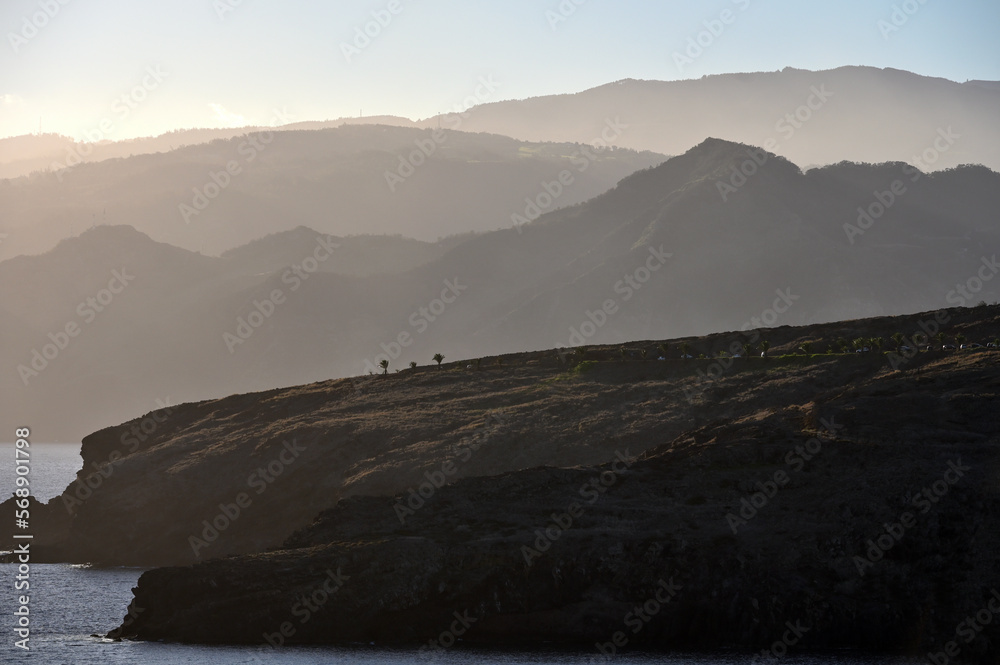 Fototapeta premium Red earth and rocks at sunset