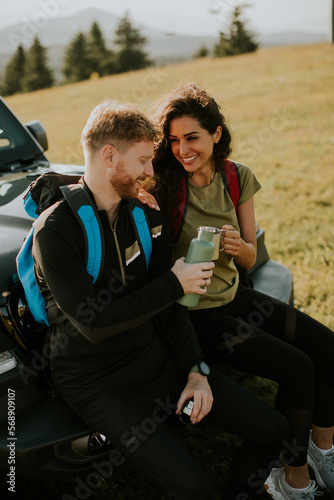 Young couple relaxing on a ...