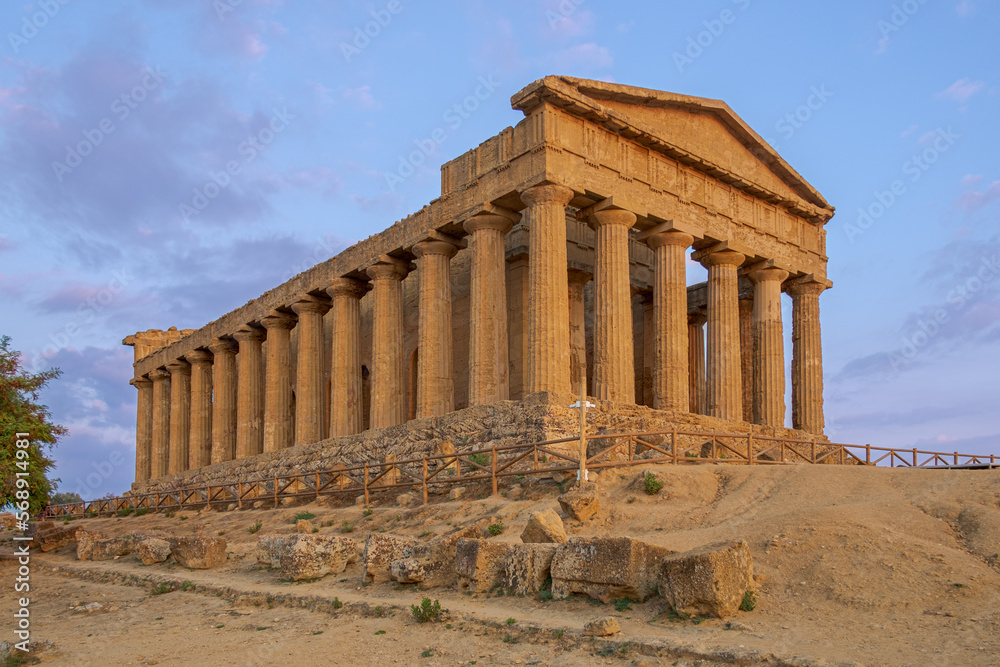 Valley of the Temples; the temple of Concordia at sunset on a summer day. Agrigento, Sicily, Italy